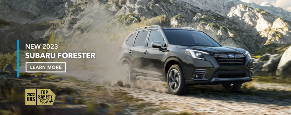 2023 Forester Premier travelling down a rough country road. 