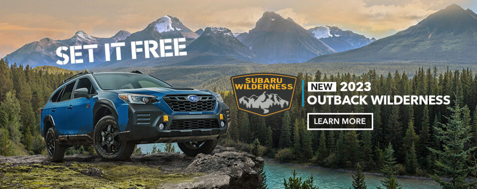 Geyser Blue 2023 Subaru Outback Wilderness outside in nature.